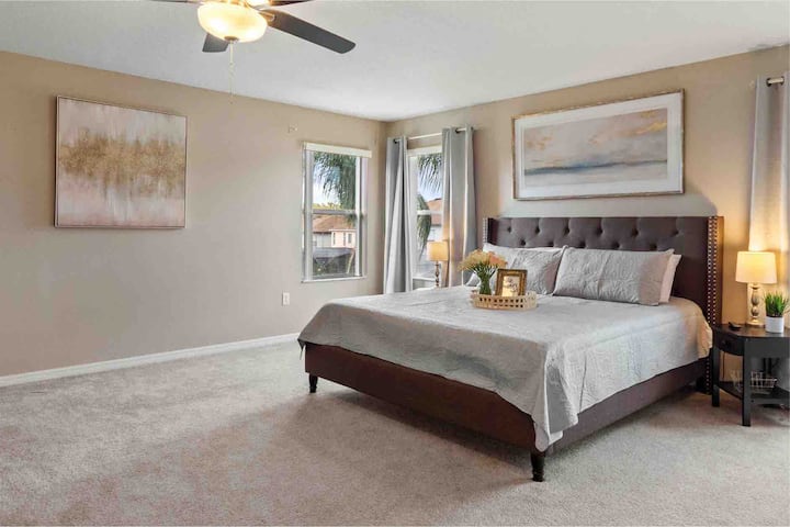 Master bedroom with en-suite bathroom. Large tub and Stand up shower. Features a King bed and is located on the second floor. Very spacious! Large walk in closet too! 