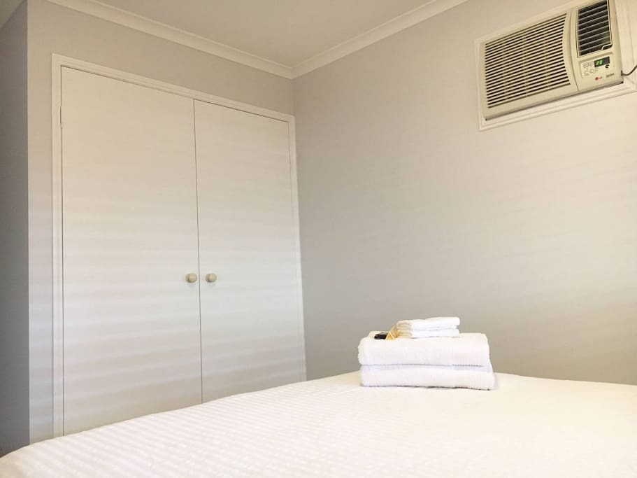Bedroom 1 with Queen size bed and closet.