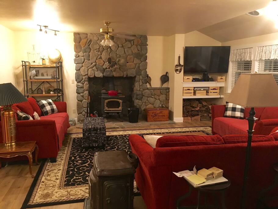 Remodeled great room with fireplace and 55 inch flat screen