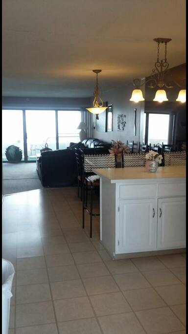 view when first walking in. kitchen to the right smaller bedroom down hallway on the left