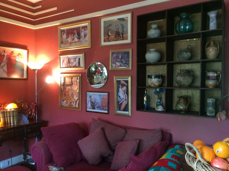 Warm, colourful and filled with vintage delights – one corner of the living room.