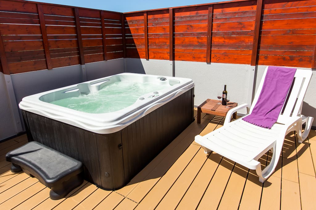 relax in private, sunny garden with jacuzzi and top quality decking