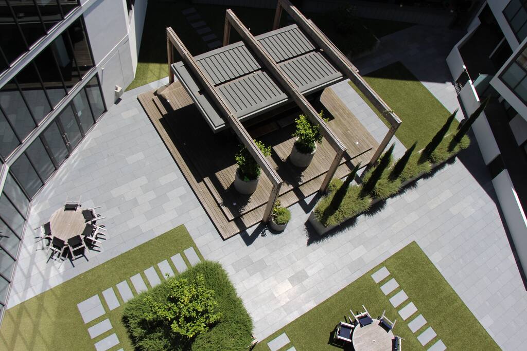 Another exceptional outdoor space - the kids can run around here whilst you supervise them from above, sipping cocktails on your top floor balcony. Actual view from your balcony.