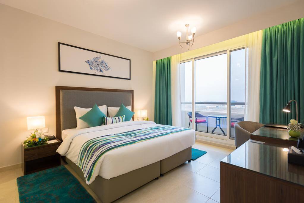 Comfy King bed in a deluxe room