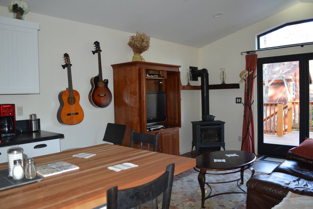 Bright and sunny, open floor plan with cozy gas fire place.