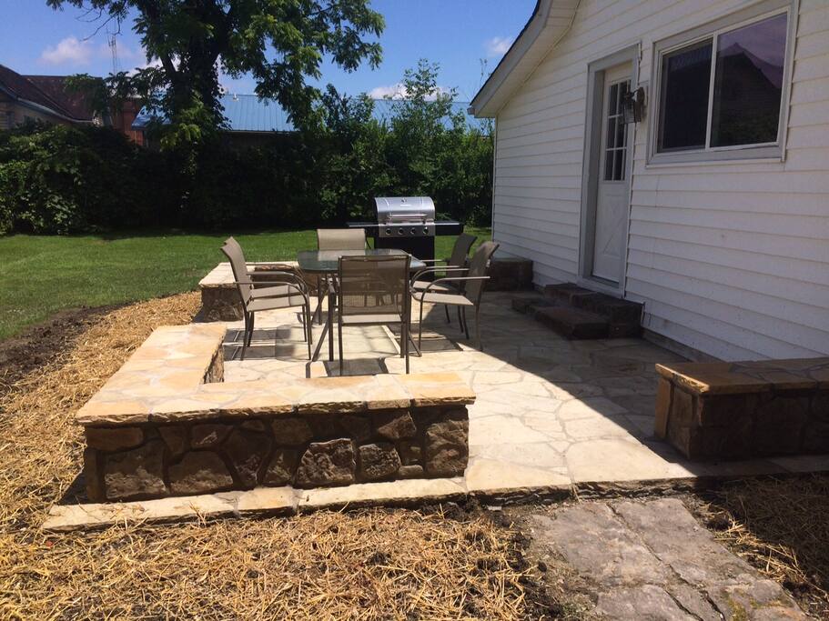 Back Patio with gas grill and sitting walls