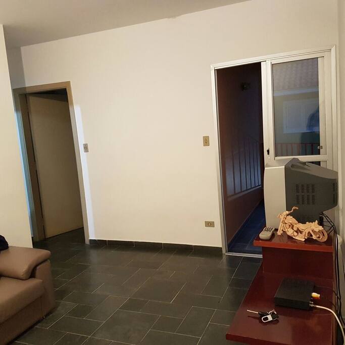 Sala de estar com sacada