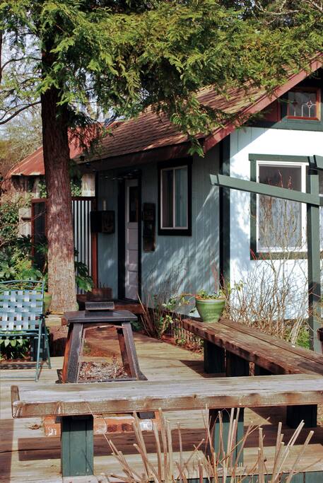 Seating around deck with outdoor fireplace