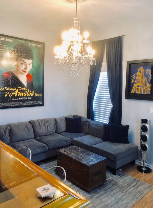 Private living room with overhead chandelier