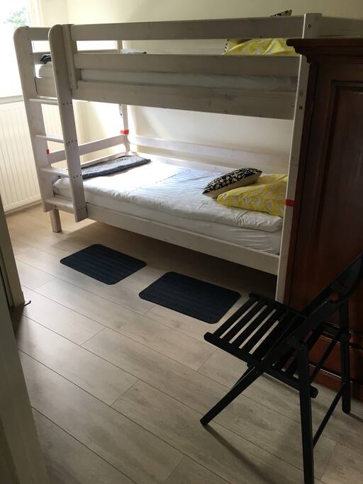 The second bedroom with two stories bed and computer.