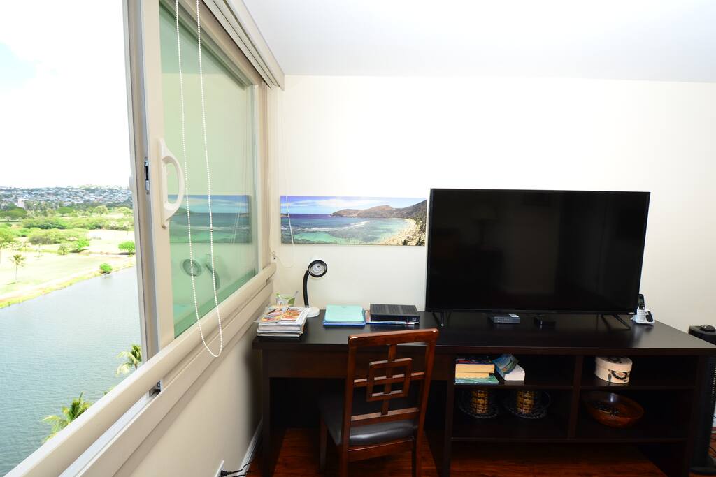 Desk and TV with high speed internet.