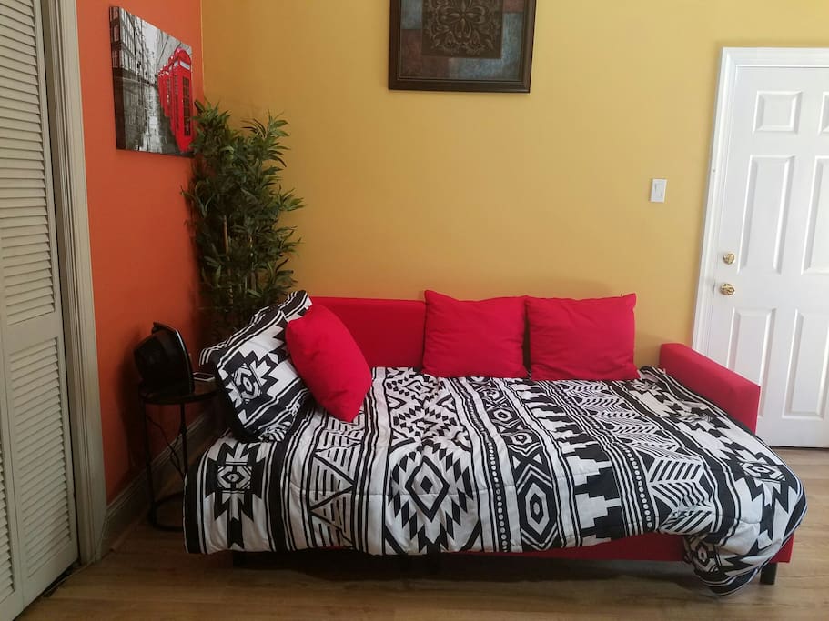Couch folds down into full bed.