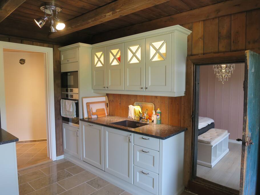 Kitchen with entrance to master bedroom