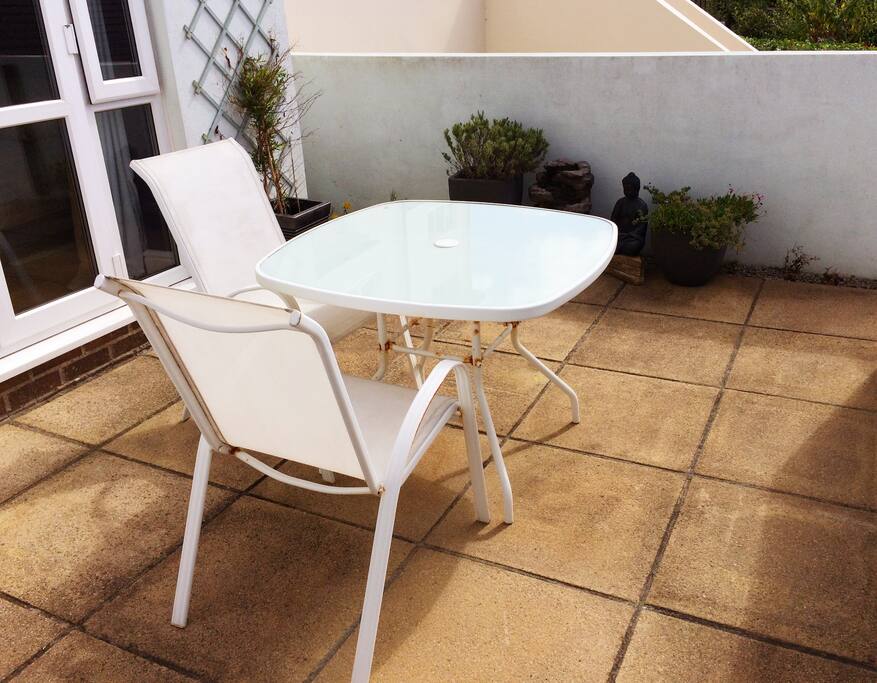 Sheltered sunny terrace just outside your room.