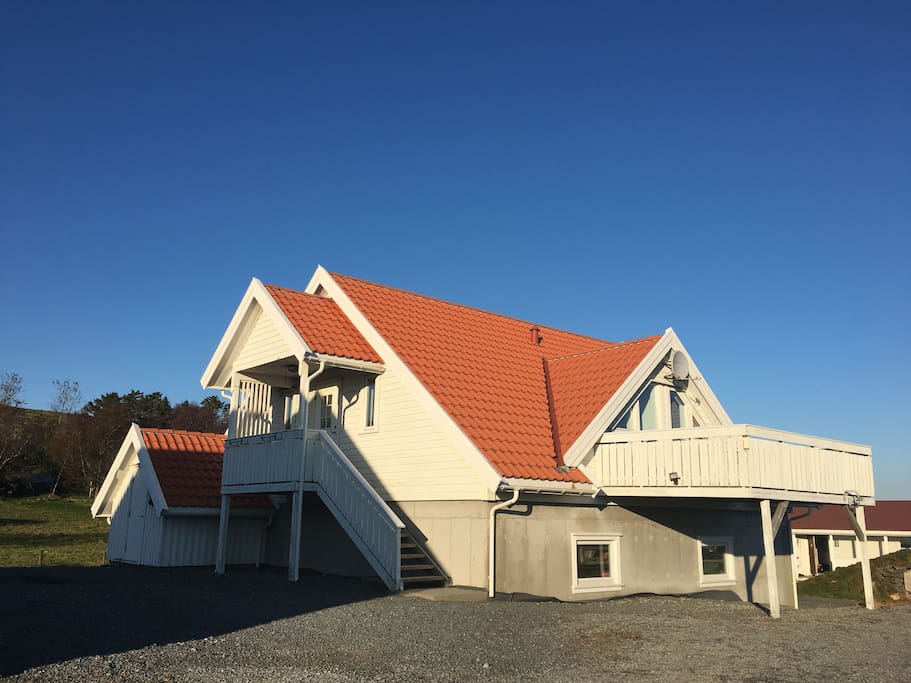 The building contains two apartaments for rental. This one is on the nearest side with the porch.