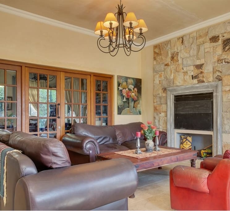 Spacious sitting room with indoor BBQ facility