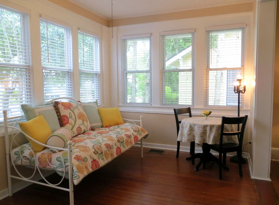 Nice open foyer with a daybed that's great for reading and naps!