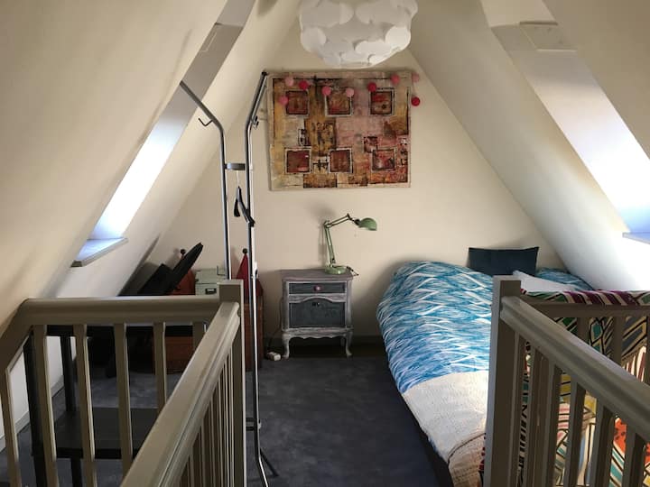 The double bed on the mezzanine open upstairs 