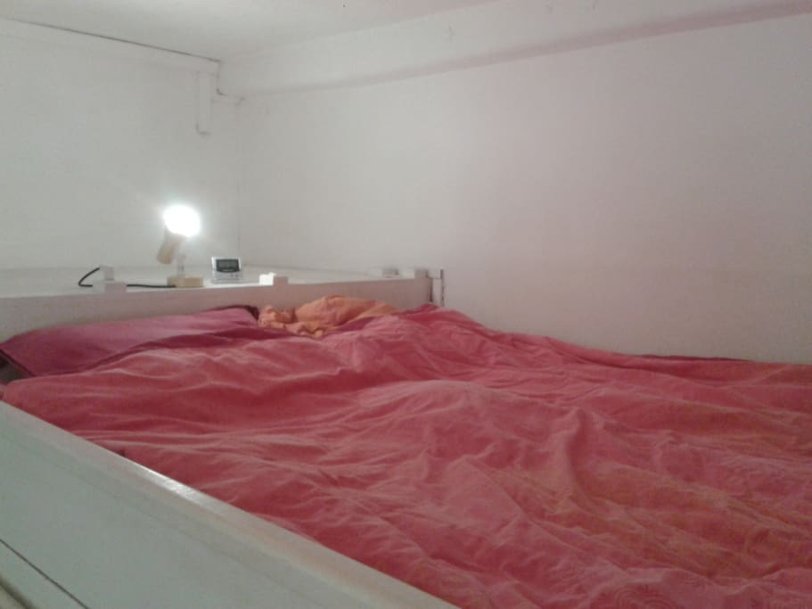 the raised double bed