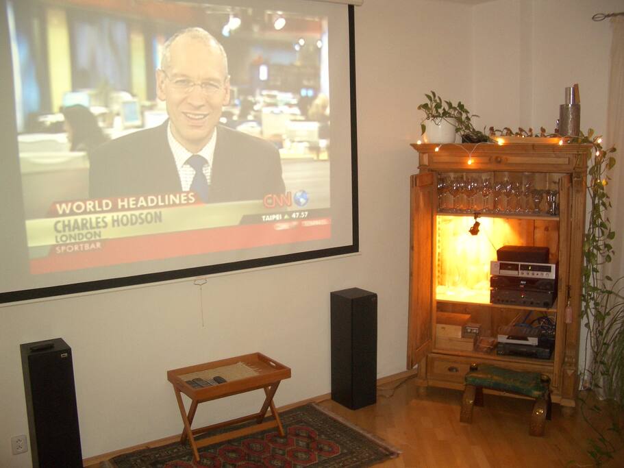 ...equipped with a beamer to watch TV, DVD or streaming from your Laptop...