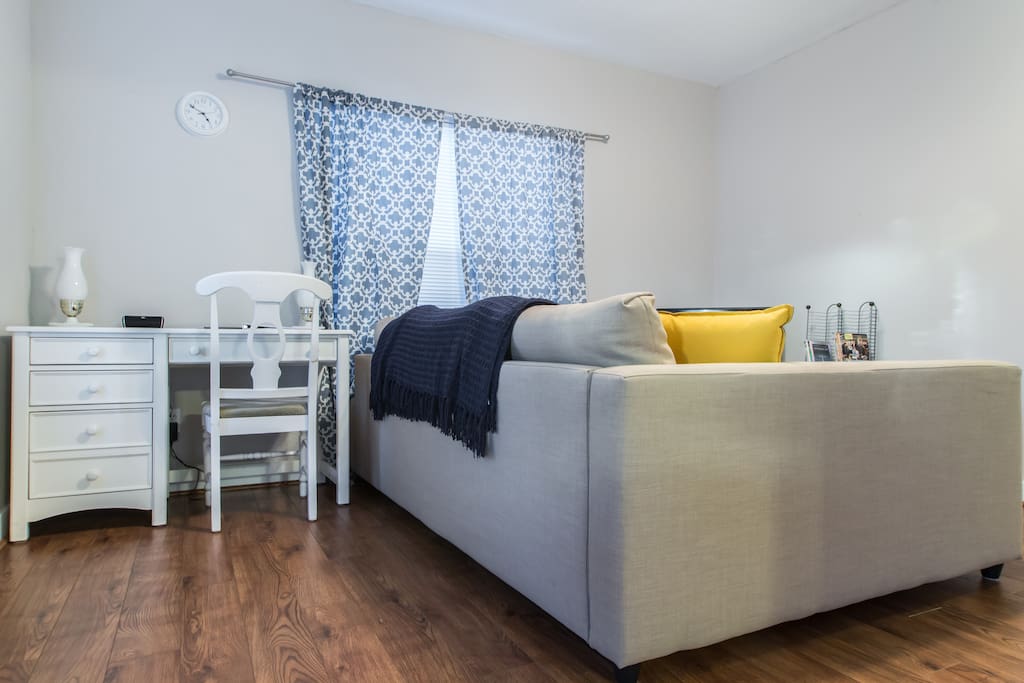 Lovely and cool living room. Desk, sleeper sofa, television, DVD player, and more available to make your stay comfortable.