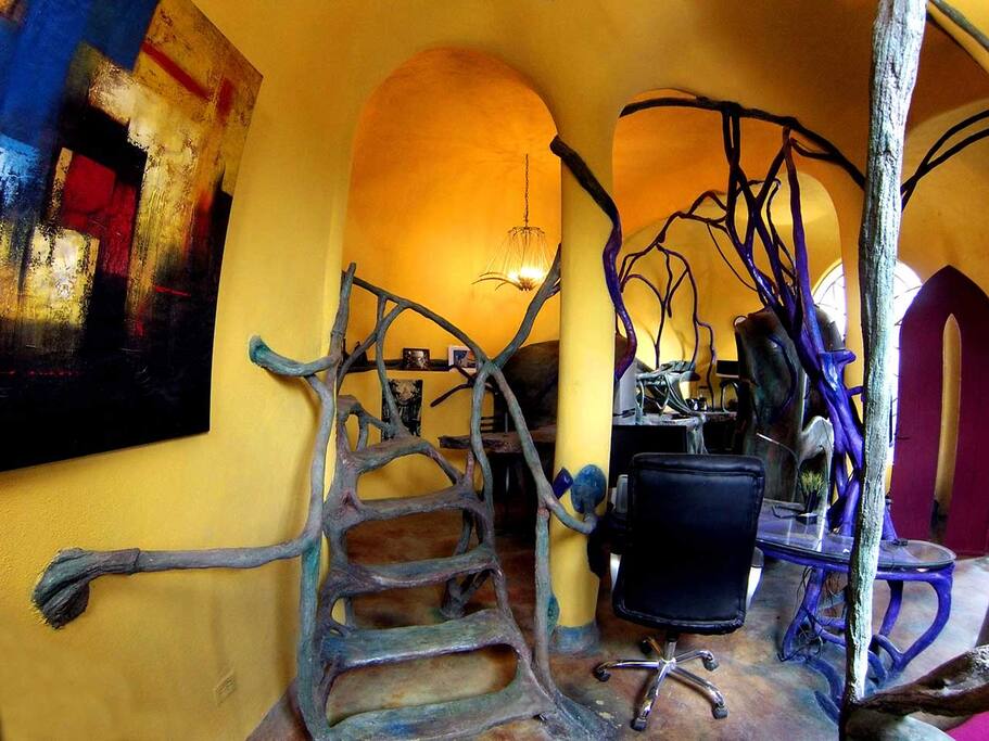 Lower floor tree vine staircase to a lofted bedroom.