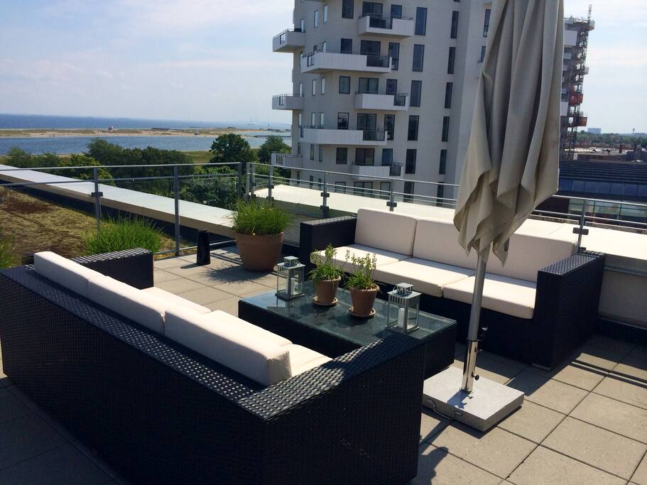 Lounge area on or private terrace with view over the ocean