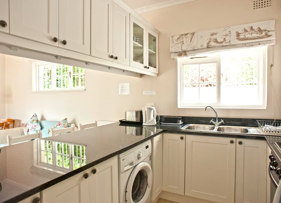 Fully equipped kitchen with a washing machine