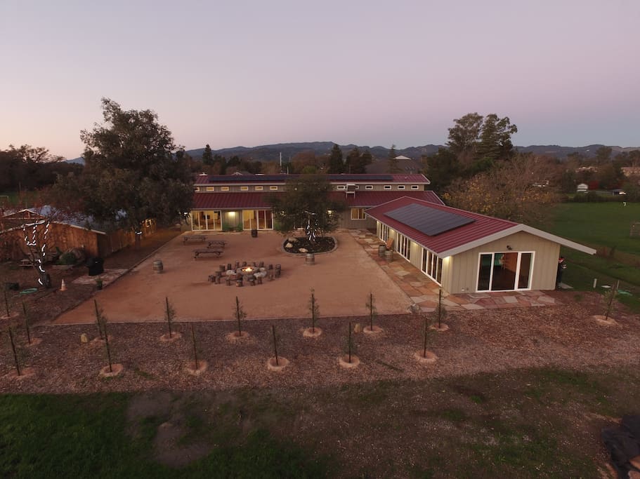 Our night sunset captures our courtyard fire pit with mostly sliding glass door access.