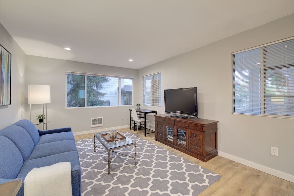 Living room includes TV with Netflix, DVD's/DVD player, board games and office/desk space.