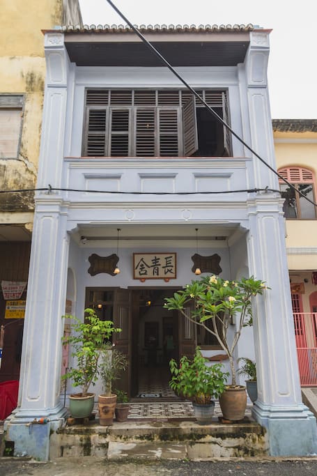 The front facade of Maison Muda Residence.
