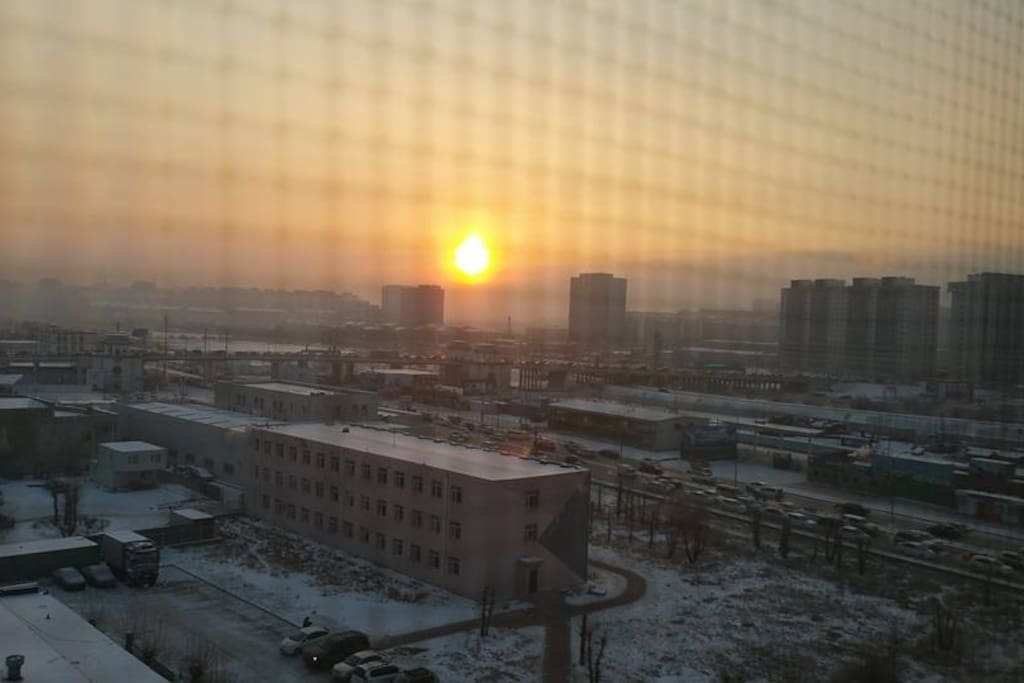 Sunrise over Ulaanbaatar from the east facing balcony. This balcony and the west facing balcony shows most of Ulaanbaatar