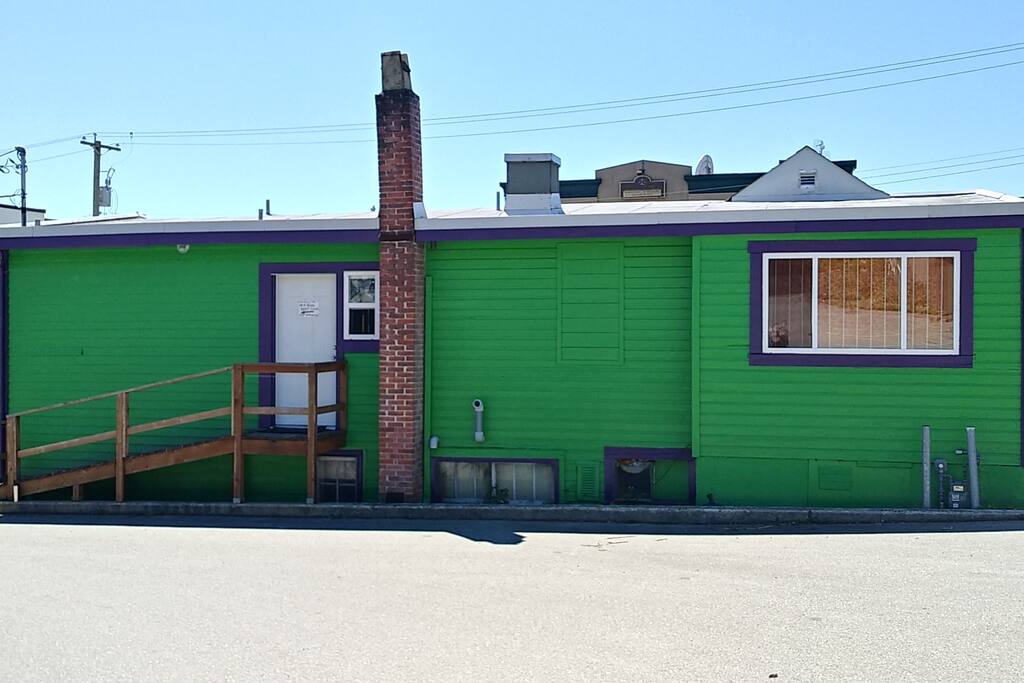 back entrance, ramp off parking lot