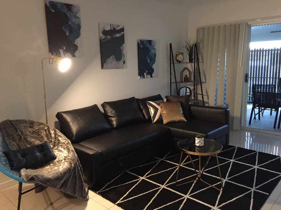 Our Large leather sofa also acts as the 3rd queen size bed .