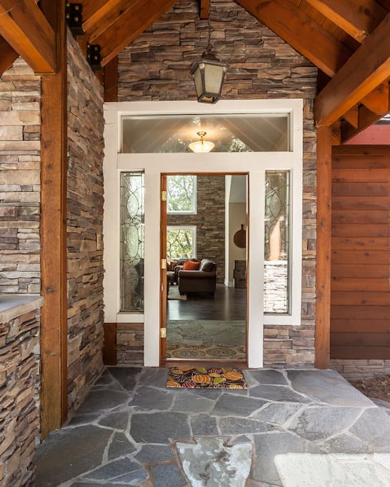 Entry to the Timberline Lodge surrounded by ledger stacked stone
