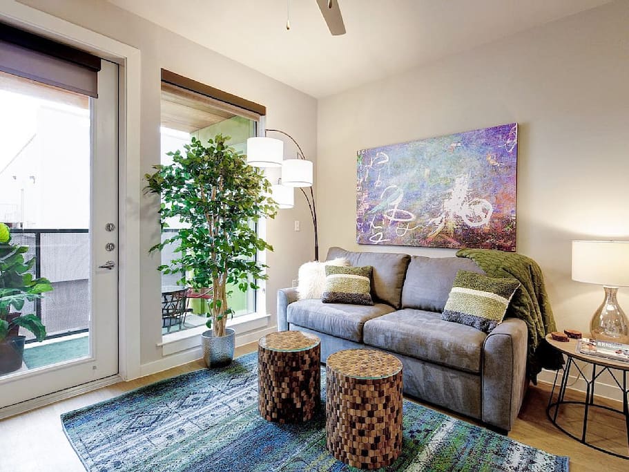 The living room has a ridiculously comfy sleeper sofa.