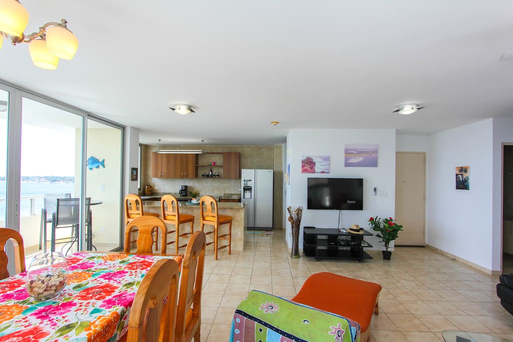 Kitchen, entertainment center, & front door
