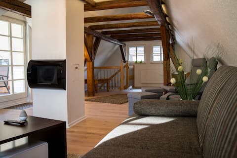 Central half-timbered house with parking garage & roof terrace