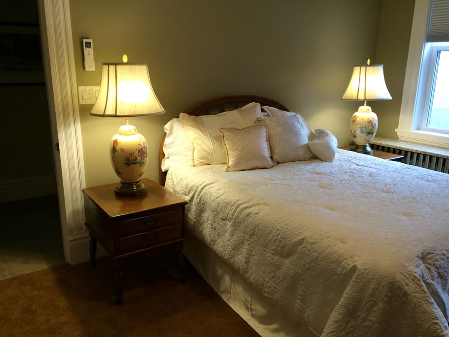 Second floor back bedroom with a queen bed