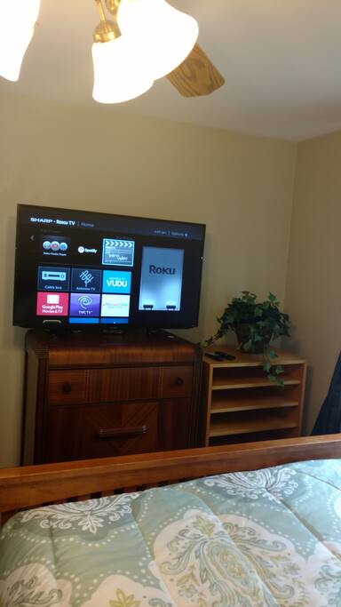 SMART TV & La-Z-Boy chair in your bedroom;dresser & closet are empty