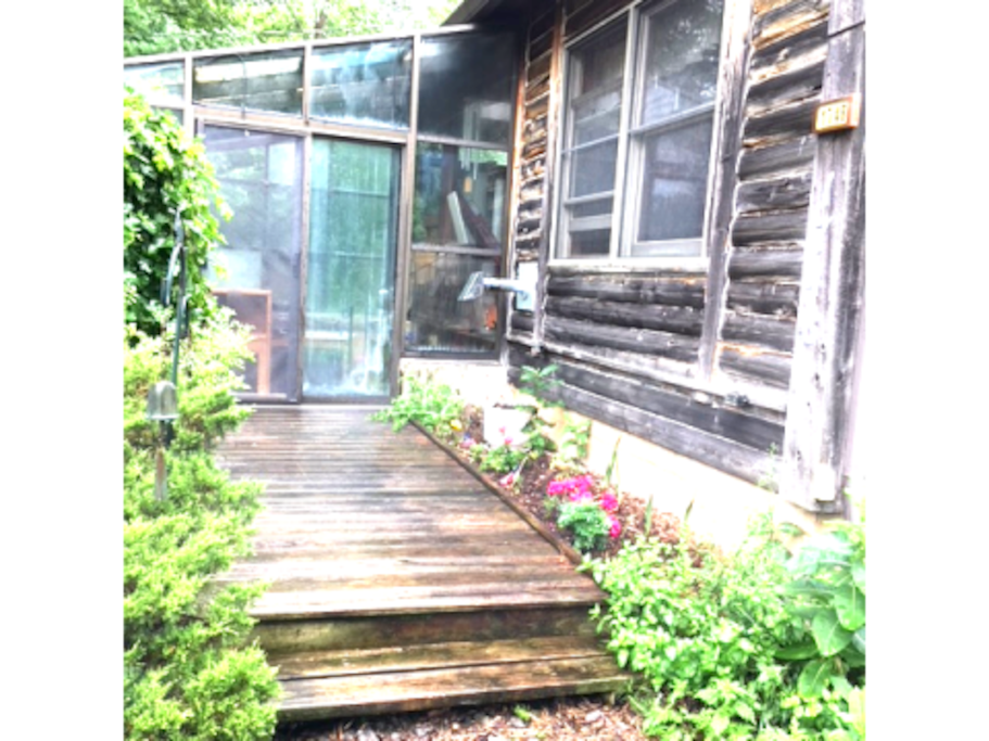Walkway to the greenhouse/three-season, private entrance.