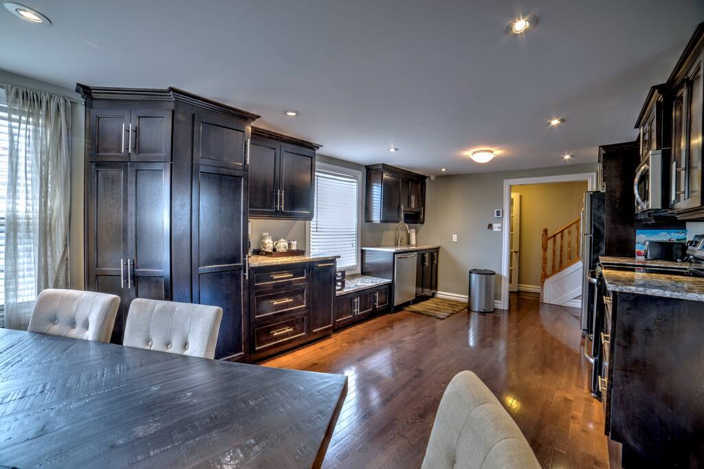 A fully stocked kitchen awaits your stay.