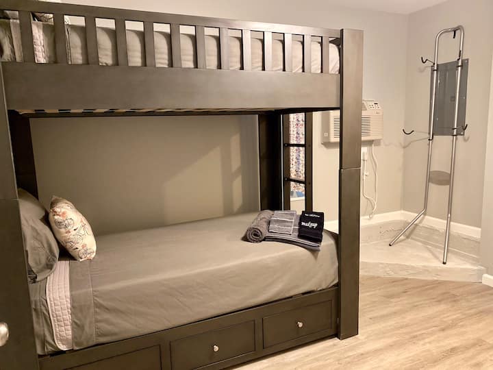 Bedroom 4 with twin-sized bunks and bike rack