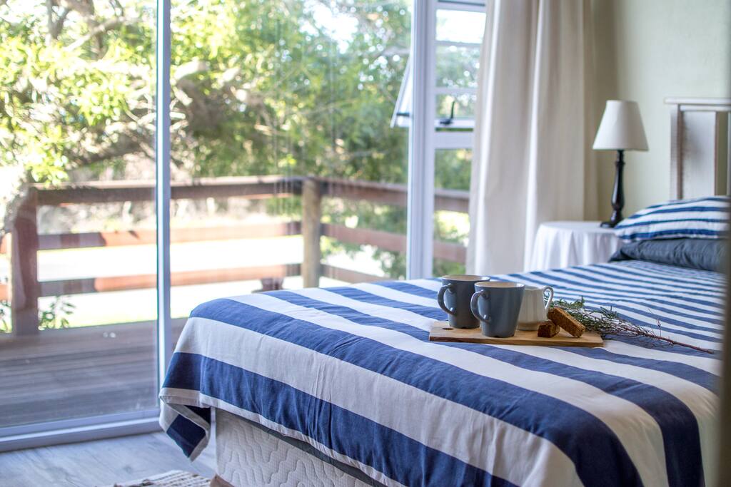 Main bedroom with private deck and ensuite