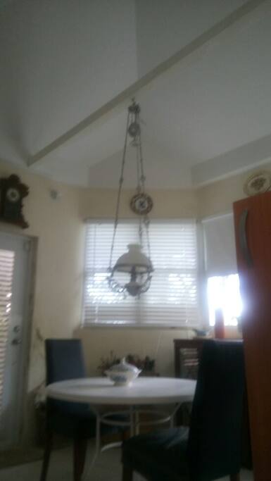 Kitchen w breakfast table and terrace