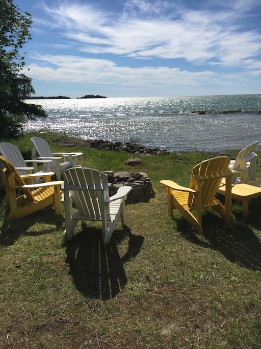 Fire pit and 6 Muskoka Chairs and tables.