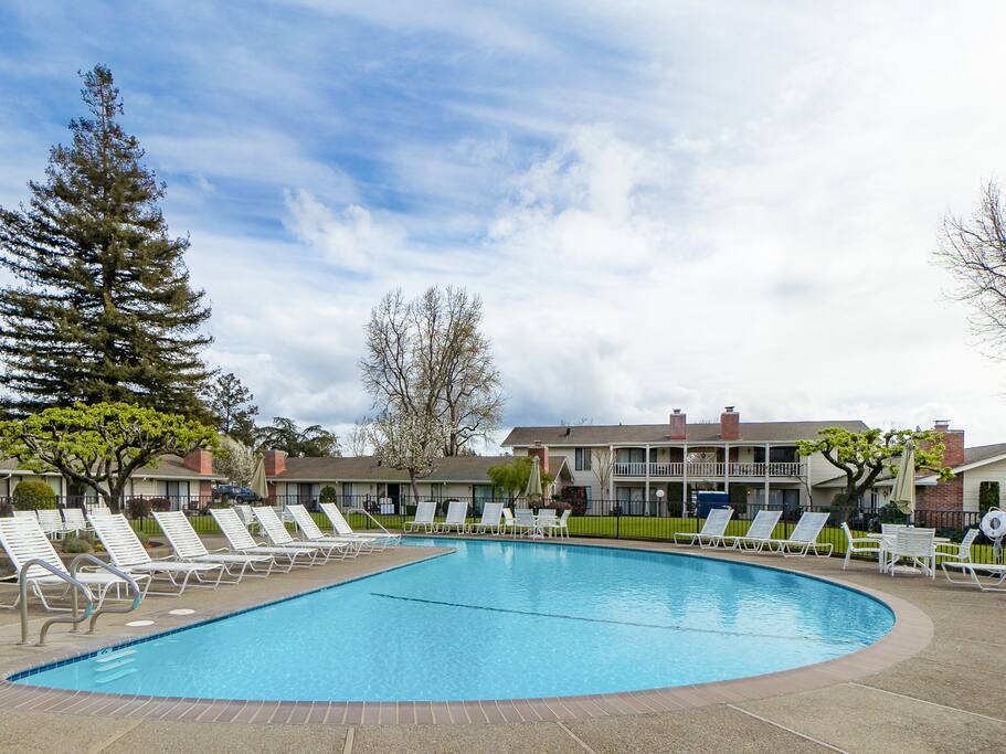 Relax on a lounge chair at the sparkling community pool.