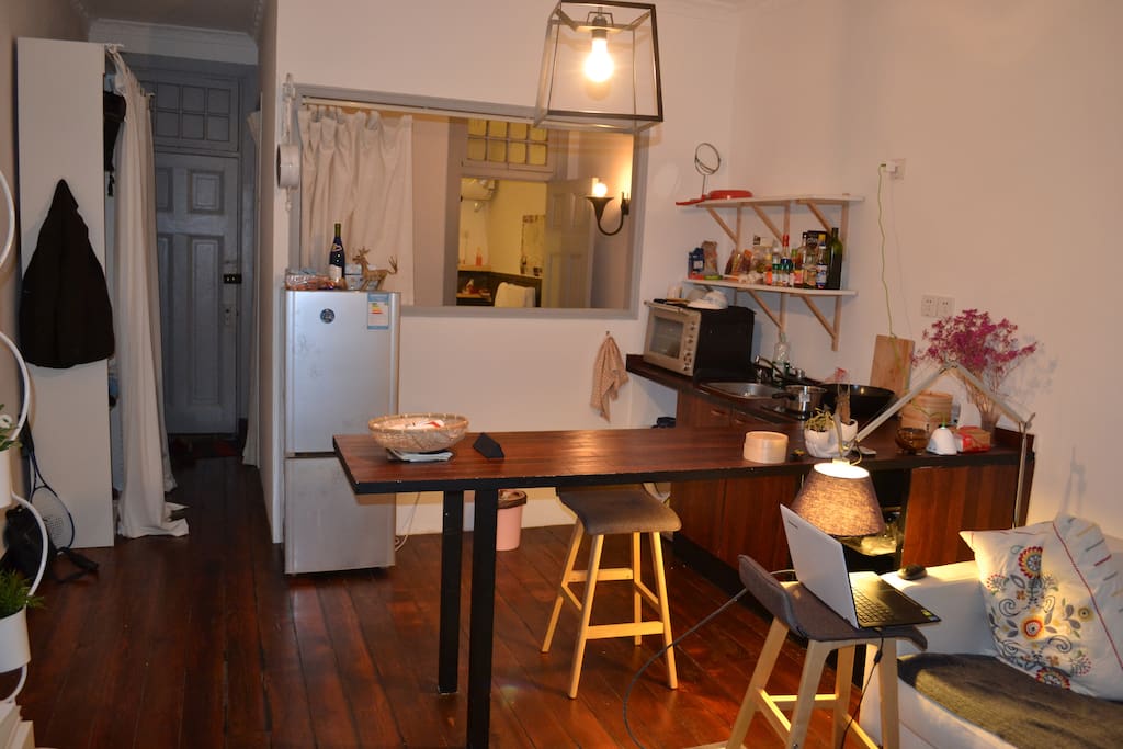 Kitchen with living room, bedroom and bathroom in the back