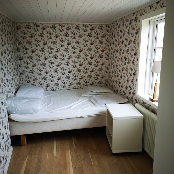 Bedroom with double bed and wardrobe