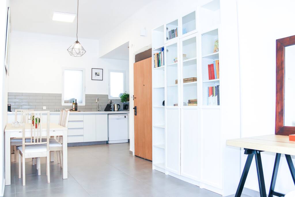 View of the kitchen from the sofa.